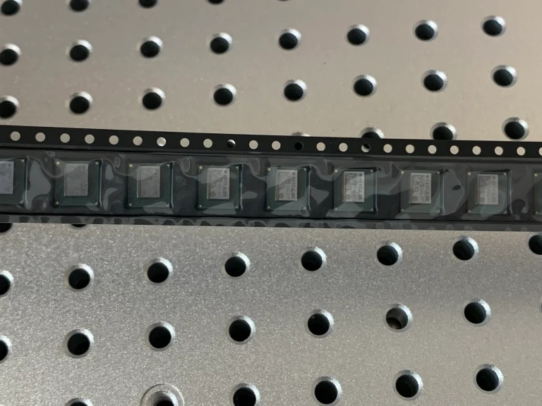 Several BZM2 ASICs packaged on a reel. 