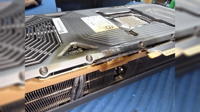 An RTX 5090 that caught fire and also left burnt marks on the motherboard, AIO cooler and RAM