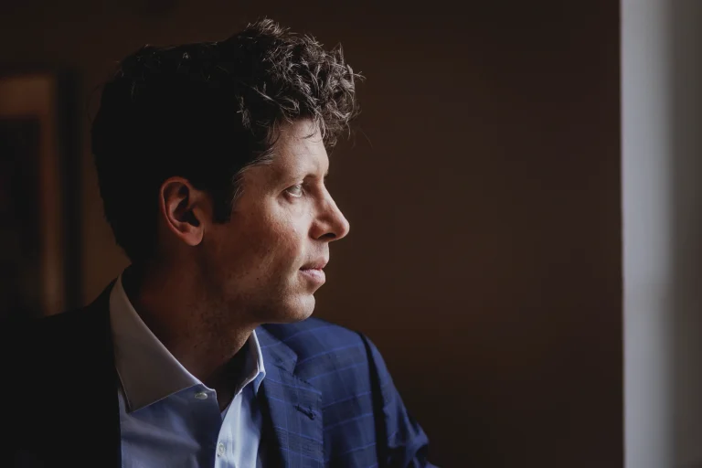 Sam Altman, CEO of OpenAI looking pensive off-camera