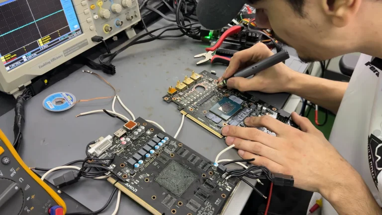 Dead RTX 5070 Ti with a hole burnt through its PCB 