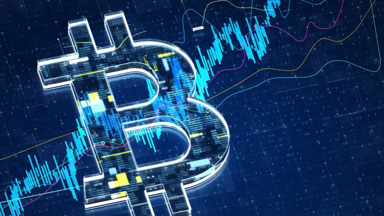 Bitcoin logo in front of a chart